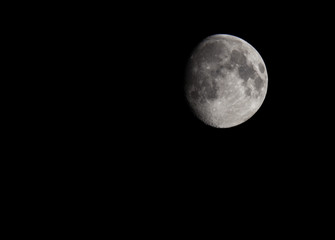 Obraz premium Photo of the Moon in the space on the black background isolated. Suitable for any purpose use