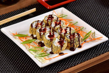 Fried sushi with sweet sauce