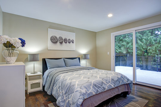 Second Floor Bedroom With Taupe Walls, Blue Bed