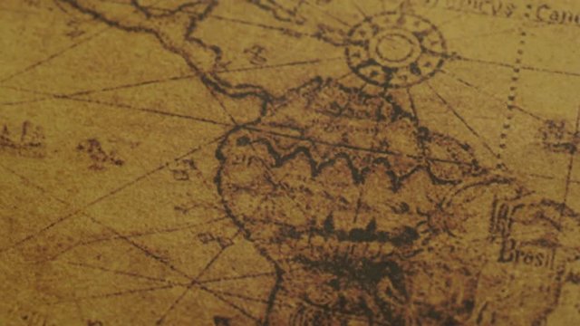 JAKARTA - Indonesia. February 08, 2018: Closeup of ancient world map of South America, America Latin, and North America with compass