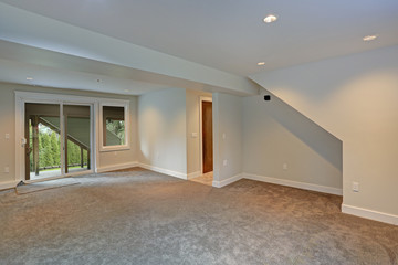 Fully renovated living area with glass doors to the backyard