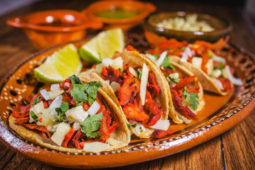 tacos al pastor and lemon mexican food in mexico city 