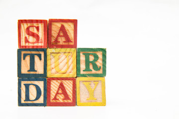 composing letters into one word, "Saturday".