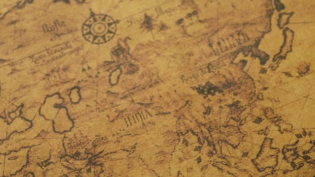 JAKARTA - Indonesia. February 08, 2018: Ancient map of Australia, Asia, Europe, Africa, and South America with compass