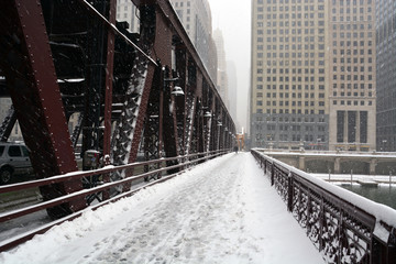 The Wells St. bridge over the Chicago River during a snow storm.