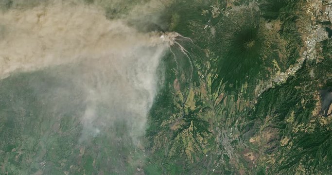 Very high-altitude overflight aerial of Fuego volcano erupting in eastern Guatemala. Clip loops and is reversible. Elements of this image furnished by USGS/NASA Landsat