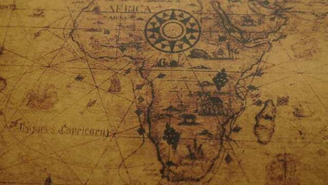 Closeup of ancient map of Africa continents with compass