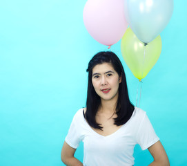 Fototapeta na wymiar Woman holding big balloons