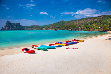 Colorful kayaks at Ao Loh Dalum beach on Phi Phi Don Island, Thailand.