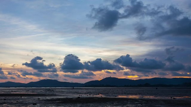 4k time lapse of clouds crossing the dramatic sky over the sea in sunset or sunrise  The clouds moving slowly over tropical sea