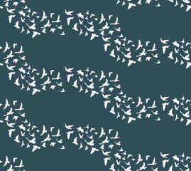 seamless pattern with a silhouette of flying birds