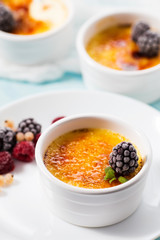 Creme brulee on a white plate
