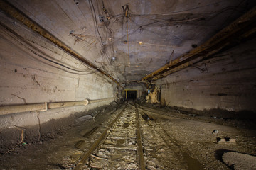 Fototapeta na wymiar Underground abandoned ore mine shaft tunnel gallery