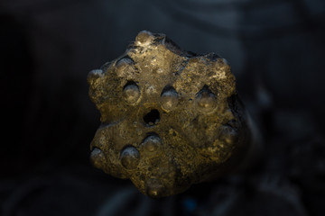 Underground iron ore mine shaft tunnel gallery with drilling machine