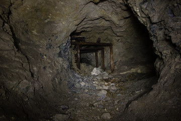 Fototapeta na wymiar Underground abandoned gold ore mine shaft tunnel gallery