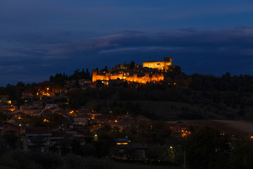 Fototapeta na wymiar Night view of the medieval Gradara castle near Pesaro city, Marche, Italy.