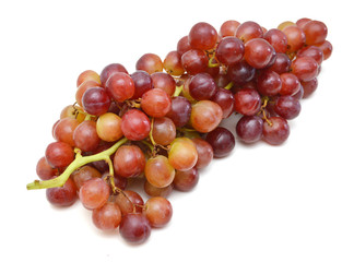 Fototapeta premium red grapes over white background