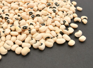 Fototapeta na wymiar Black-eyed Beans on black background.