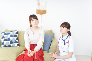 Woman inserting an intravenous line