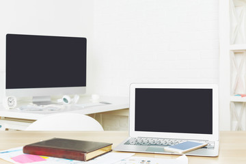 Stylish desktop with empty laptop screen