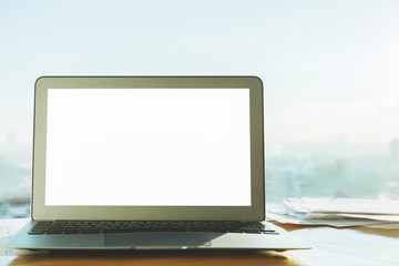 Fototapeta premium Empty white laptop closeup