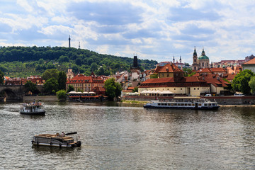 Fototapeta na wymiar View of Vltava River and Castle of Prague on a sunny day
