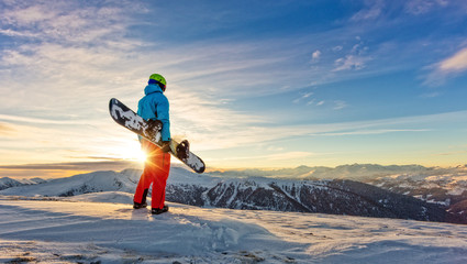 Snowboarder on the top of mountain, Alpine scenery