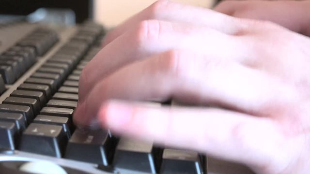 4K close up hands fingers typing fast desktop computer keyboard used keys view