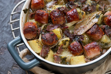 Close-up of Irish coddle or sausage, bacon, onion and potato hotpot, selective focus