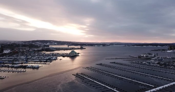 Aerial footage of Frognerkilen Marina and Aker Brygge at sunrise in Oslo, Norway