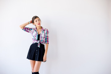 Fototapeta premium Hipster girl worried what to dress to the party
