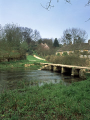 England, Cotswolds, Gloucestershire, Eastleach, River Leach, ancient clapper bridge