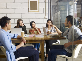 Team of entrepreneurs meeting in an office