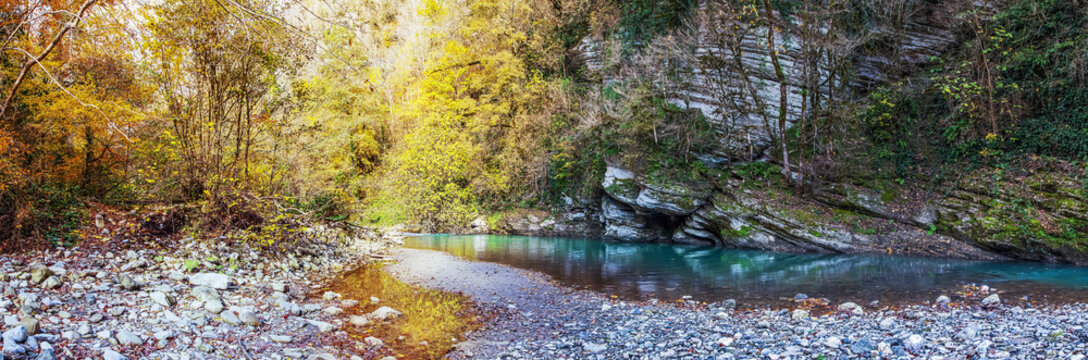 Evening shadows in the gorge of the Khosta River in autumn. Sochi National Park.