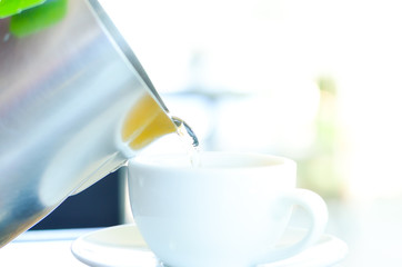 Hot tea time in holiday,break time or relaxing time outside,select focus.