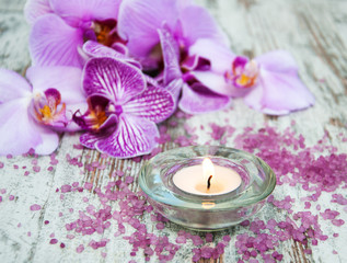 Fototapeta na wymiar Candle with orchids