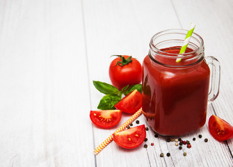Jars with tomato juice