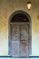 Old wooden brown house door