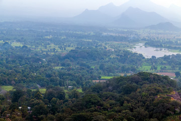 Fototapeta premium Sigiriya Rock or Sinhagiri aerial panoramic view, which dominates the jungle from all sides, Dambulla in Sri Lanka.