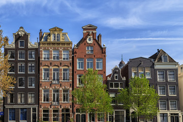 Fototapeta premium Traditional old buildings in Amsterdam.