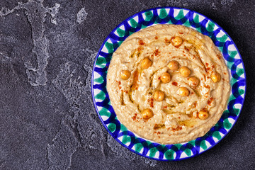 Classic hummus  on the plate.