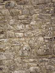 Ancient stone wall textures around the cathedral in the UK's smallest city of St Davids, Pembrokeshire, Wales, UK