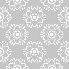 White floral seamless design on gray background