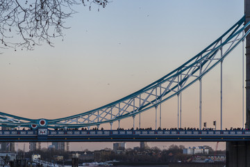 a fragment of Tower Bridge in London at sunset