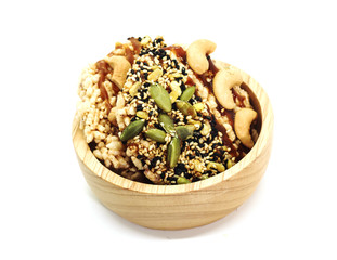 Closeup of two Sweet Crispy Rice Cracker with several cereal on wood cup