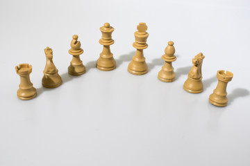 Chess pieces composition in a white background