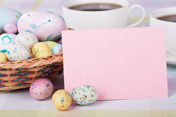 Blank envelope with Easter candy and eggs