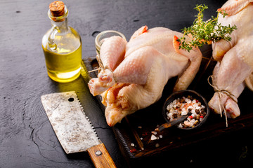 Whole Raw Chicken with Herbs and Spices on Wooden Cutting Board Food Ingredient Cooking Background Bird Meat