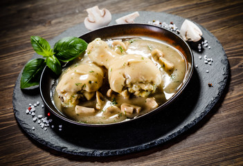 Chicken legs with mushroom sauce