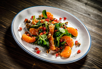 Vegetable salad on wooden background